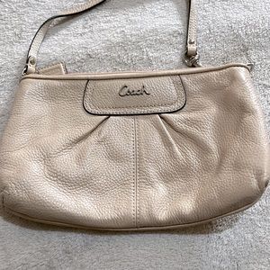 Coach large wristlet/wallet Cream in color. Zip closure